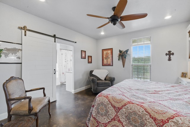 bedroom with finished concrete flooring, a barn door, recessed lighting, baseboards, and ceiling fan