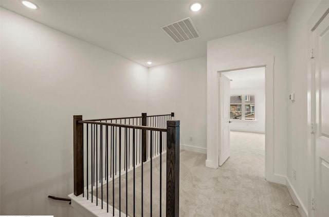 4702 Smokey Quartz Ln, Arlington, TX 76005 - hall featuring light colored carpet, an upstairs landing, recessed lighting, and baseboards