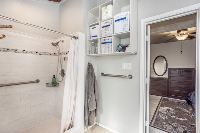 1916 N Lake Trl, Denton, TX 76201 - full bathroom with a tile shower, ceiling fan, and baseboards
