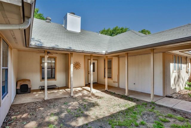 1916 N Lake Trl, Denton, TX 76201 - back of house featuring a patio area and a chimney