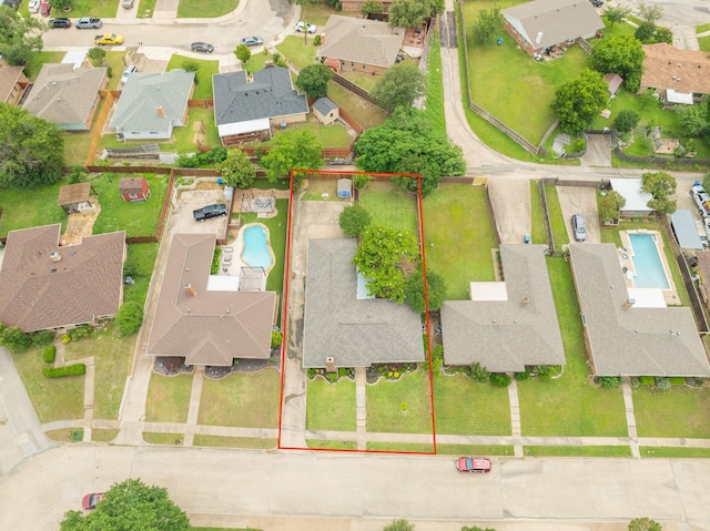 aerial view of residential area featuring a pool and property boundaries highlighted