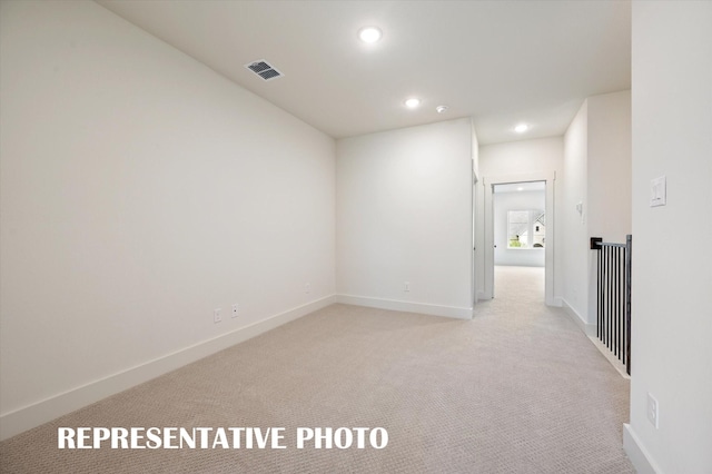 4716 Smokey Quartz Ln, Arlington, TX 76005 - empty room with light carpet, baseboards, and recessed lighting