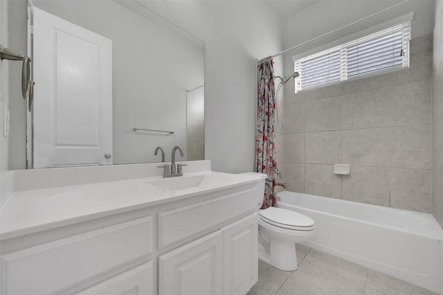 full bathroom featuring toilet, tile patterned flooring, shower / tub combo, and vanity