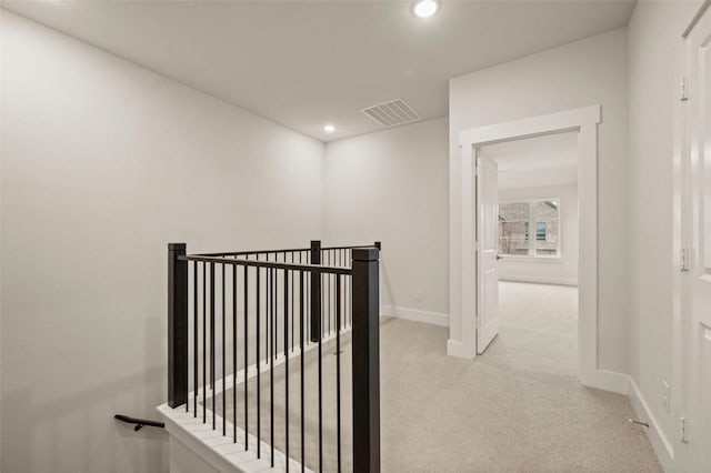 4732 Smokey Quartz Ln, Arlington, TX 76005 - corridor with an upstairs landing, light colored carpet, baseboards, and recessed lighting
