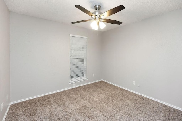 1017 Westminster Ln, Garland, TX 75040 - carpeted empty room with ceiling fan and baseboards