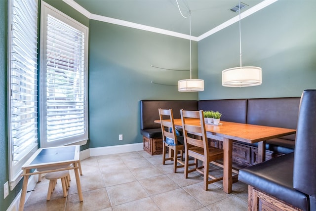 1615 San Andres Dr, Frisco, TX 75033 - dining area featuring ornamental molding, light tile patterned flooring, and baseboards