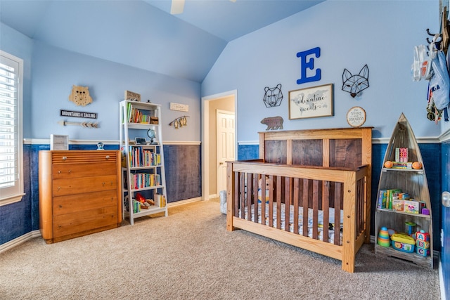 1615 San Andres Dr, Frisco, TX 75033 - bedroom with carpet flooring, multiple windows, vaulted ceiling, and a crib
