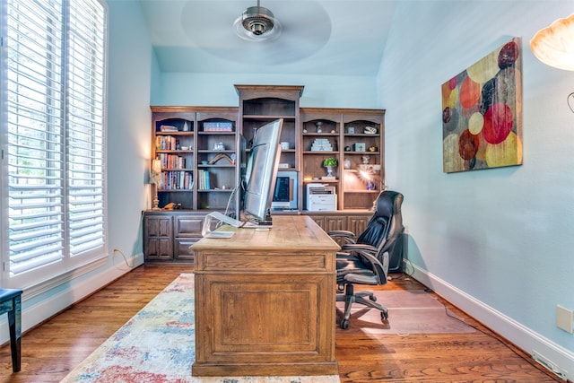 1615 San Andres Dr, Frisco, TX 75033 - office space with baseboards, wood finished floors, and a ceiling fan