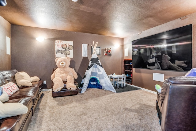 1615 San Andres Dr, Frisco, TX 75033 - carpeted cinema room featuring a textured wall, a textured ceiling, and baseboards
