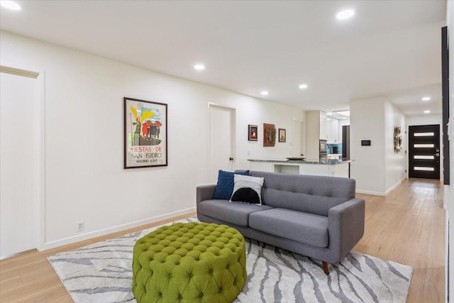 3020 N 43rd St, Waco, TX 76710 - living area featuring light wood-style flooring, recessed lighting, and baseboards