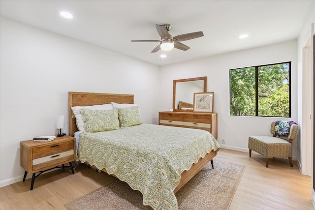 3020 N 43rd St, Waco, TX 76710 - bedroom with light wood-style flooring, recessed lighting, a ceiling fan, and baseboards