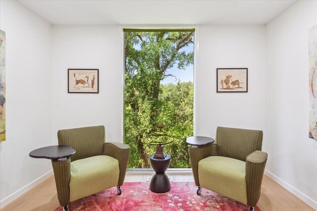 3020 N 43rd St, Waco, TX 76710 - sitting room featuring wood finished floors and baseboards