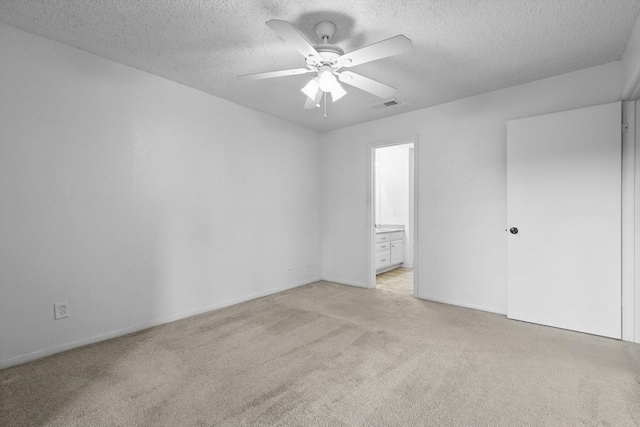 2000 Willoughby Ln Unit 5520, Arlington, TX 76011 - spare room with a ceiling fan, light carpet, a textured ceiling, and baseboards