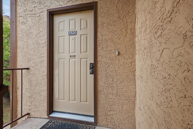 2000 Willoughby Ln Unit 5520, Arlington, TX 76011 - view of exterior entry with stucco siding