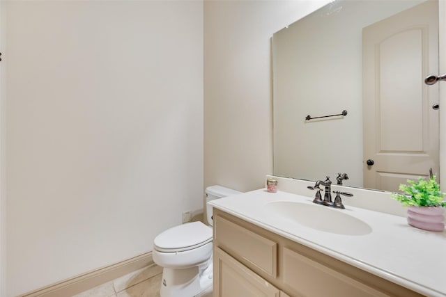 2137 Langdon Dr, Frisco, TX 75033 - half bathroom with tile patterned floors, toilet, and vanity