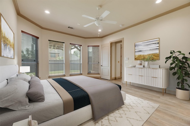 2137 Langdon Dr, Frisco, TX 75033 - bedroom with crown molding, light wood-type flooring, recessed lighting, a ceiling fan, and baseboards