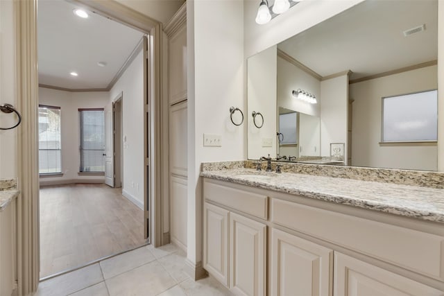 2137 Langdon Dr, Frisco, TX 75033 - bathroom with ornamental molding, vanity, baseboards, recessed lighting, and tile patterned floors