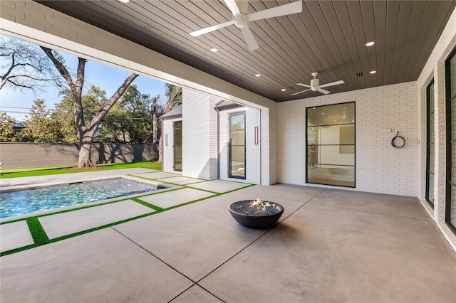 view of patio / terrace featuring a ceiling fan and fence