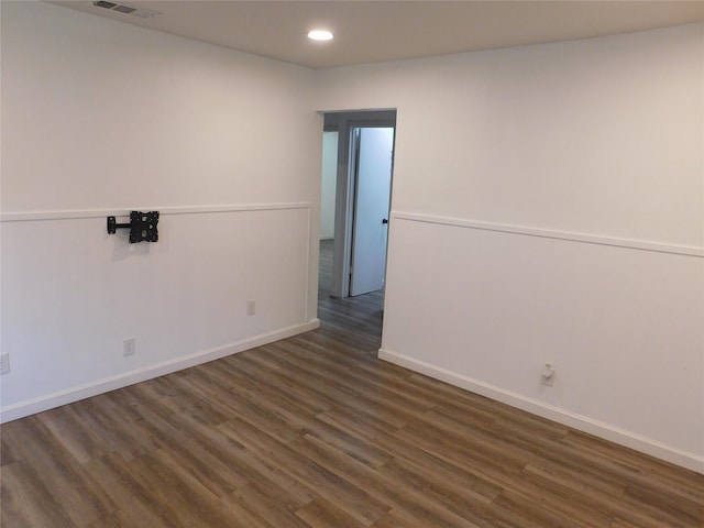 4902 Meyers Ln, Bellmead, TX 76705 - empty room with dark wood-style floors, recessed lighting, and baseboards
