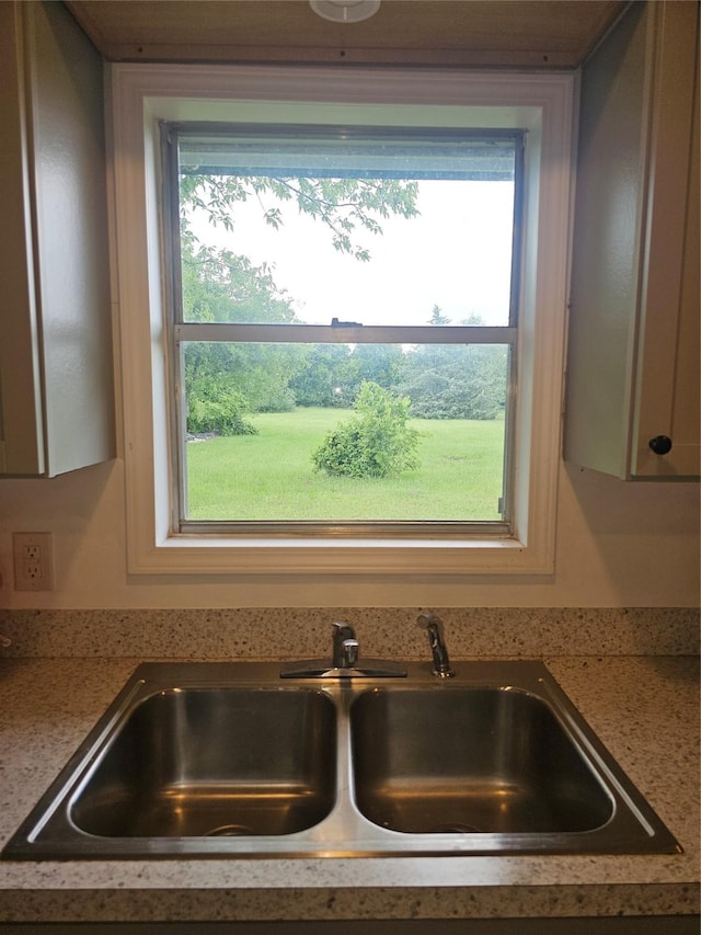 4902 Meyers Ln, Bellmead, TX 76705 - kitchen view of a sink and light countertops