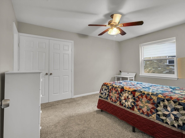 bedroom featuring carpet, a ceiling fan, and baseboards