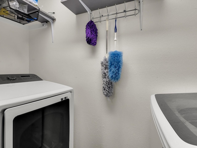 laundry room with washer / dryer