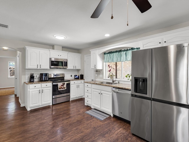 624 Hallvale Dr, White Settlement, TX 76108 - kitchen with appliances with stainless steel finishes, a sink, light stone counters, a ceiling fan, and recessed lighting
