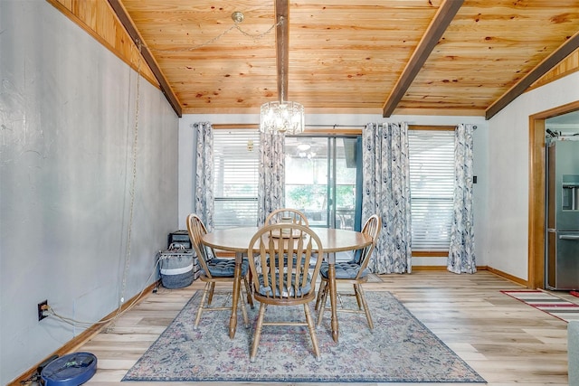 814 Branding Iron Trl, Granbury, TX 76049 - dining space featuring wooden ceiling, light wood finished floors, a chandelier, and baseboards