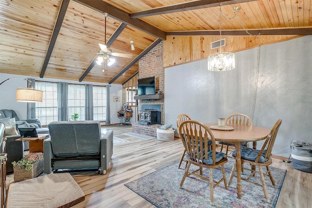 814 Branding Iron Trl, Granbury, TX 76049 - dining room with wood ceiling, beam ceiling, light wood-type flooring, a chandelier, and ceiling fan