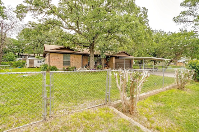 814 Branding Iron Trl, Granbury, TX 76049 - view of front of property featuring a carport, a gate, brick siding, and driveway