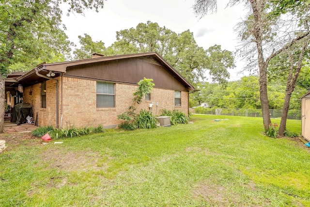 814 Branding Iron Trl, Granbury, TX 76049 - view of side of property featuring brick siding and a chimney