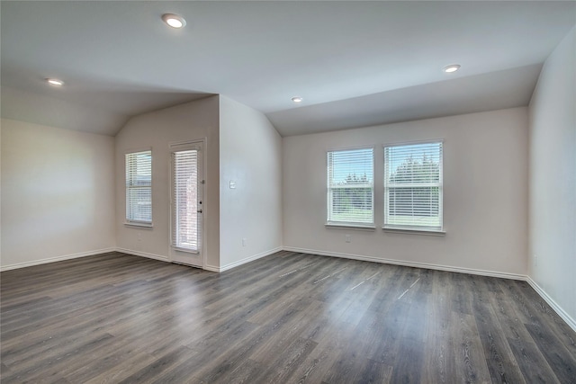 2229 Darner Dr, Fate, TX 75189 - unfurnished room with vaulted ceiling, dark wood-style flooring, baseboards, and recessed lighting