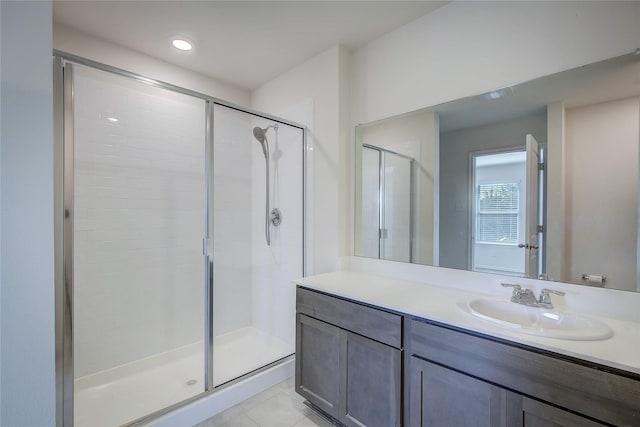 2229 Darner Dr, Fate, TX 75189 - bathroom featuring a stall shower, vanity, and tile patterned floors