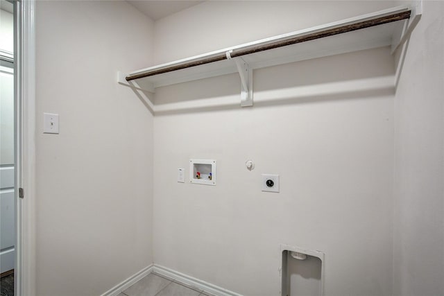 2229 Darner Dr, Fate, TX 75189 - laundry area featuring hookup for an electric dryer, washer hookup, gas dryer hookup, baseboards, and light tile patterned floors