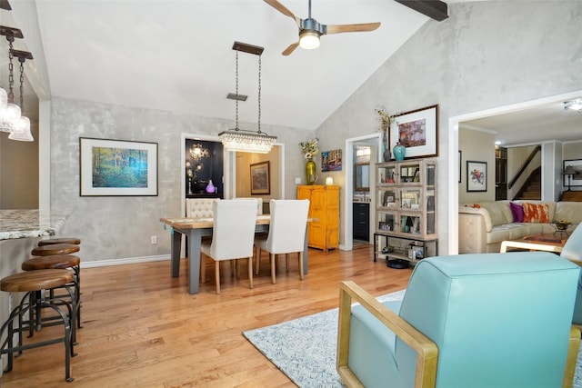 1010 Kings Canyon Ct, Grapevine, TX 76051 - living area with wood finished floors, a ceiling fan, stairs, beam ceiling, and a chandelier