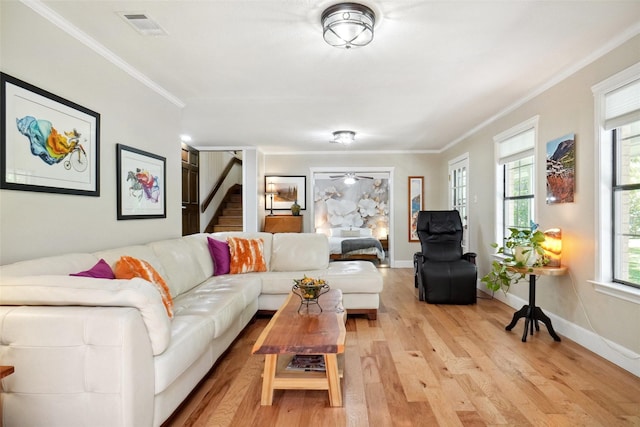 1010 Kings Canyon Ct, Grapevine, TX 76051 - living room featuring stairs, light wood finished floors, ornamental molding, and baseboards