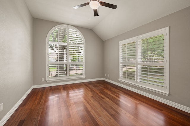 904 Blue Jay Ln, Coppell, TX 75019 - empty room with ceiling fan, wood finished floors, baseboards, and vaulted ceiling