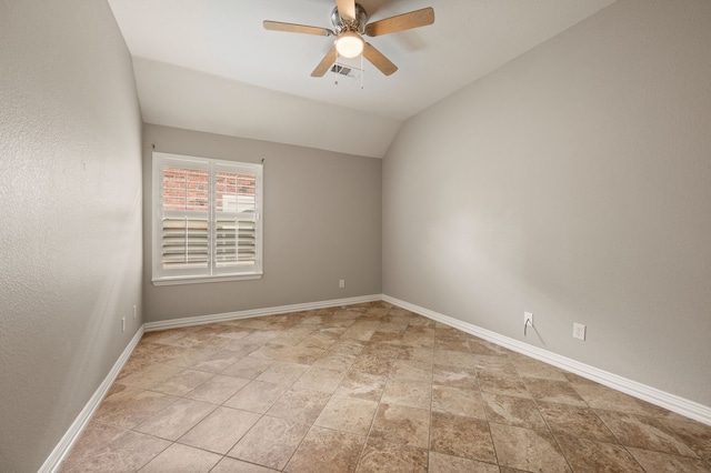 904 Blue Jay Ln, Coppell, TX 75019 - empty room featuring ceiling fan, light stone finish floors, baseboards, and vaulted ceiling