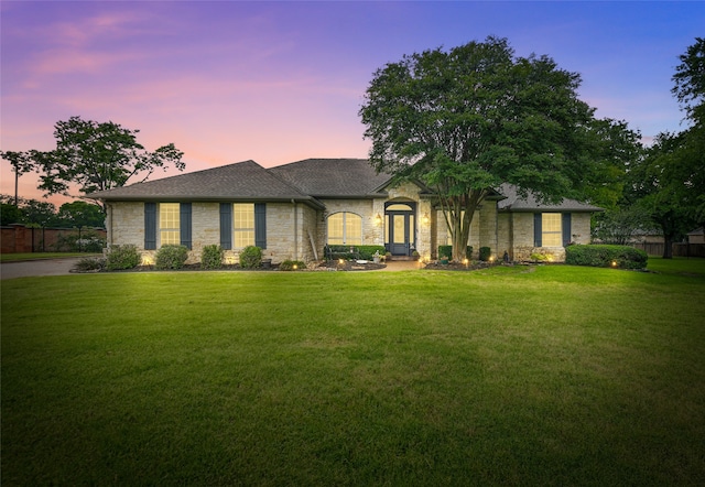 4019 Brooks Ct, Highland Village, TX 76226 - french provincial home featuring stone siding, a front yard, and roof with shingles