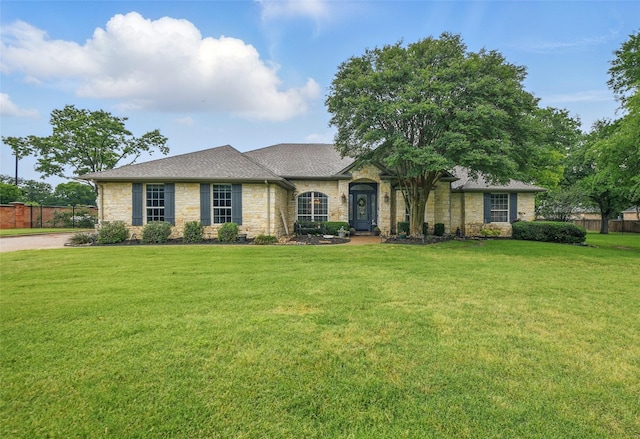 4019 Brooks Ct, Highland Village, TX 76226 - view of front facade featuring stone siding and a shingled roof