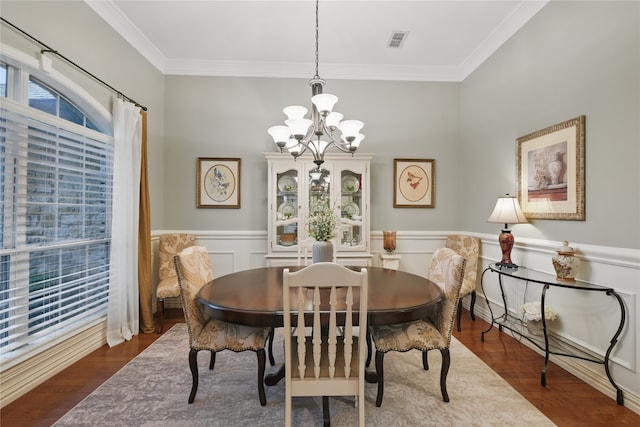 4019 Brooks Ct, Highland Village, TX 76226 - dining space with a chandelier, wood finished floors, crown molding, and a wainscoted wall