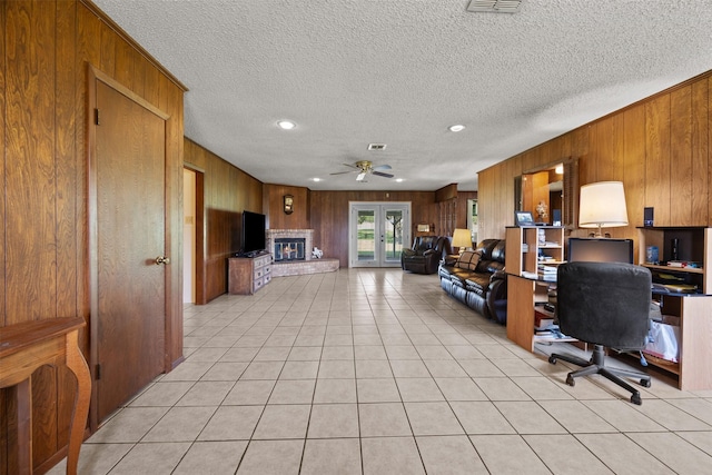 150 N Powell Dr, Hubbard, TX 76648 - office area with wooden walls, a textured ceiling, ceiling fan, recessed lighting, and light tile patterned flooring