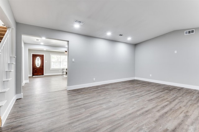 437 22nd St, Grand Prairie, TX 75050 - unfurnished living room with stairway, wood finished floors, baseboards, and recessed lighting