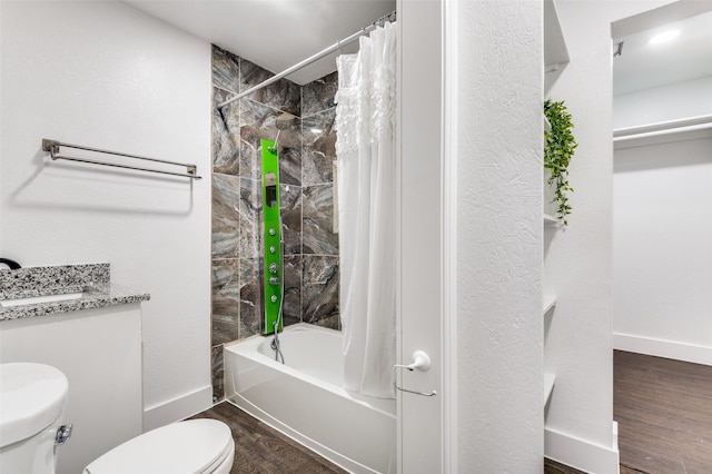 437 22nd St, Grand Prairie, TX 75050 - full bath with shower / tub combo with curtain, toilet, wood finished floors, and baseboards