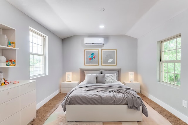 437 22nd St, Grand Prairie, TX 75050 - bedroom featuring a wall mounted air conditioner, light carpet, baseboards, and lofted ceiling
