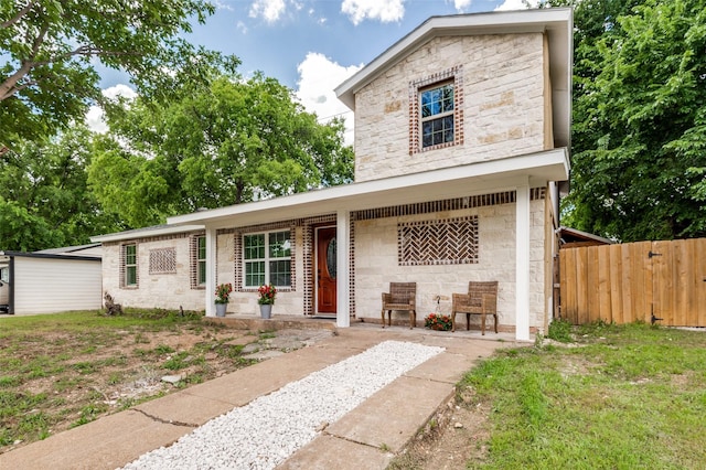 437 22nd St, Grand Prairie, TX 75050 - view of front of home with stone siding and fence
