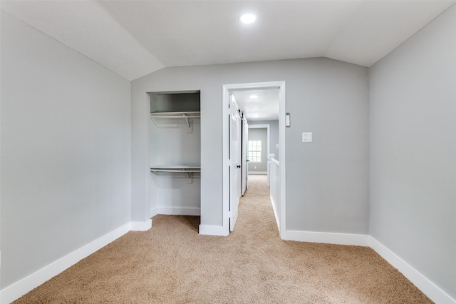 437 22nd St, Grand Prairie, TX 75050 - unfurnished bedroom with light colored carpet, vaulted ceiling, a closet, baseboards, and recessed lighting