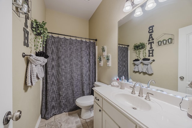 bathroom with toilet, vanity, tile patterned flooring, and a shower with curtain