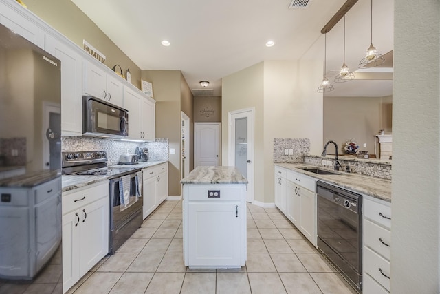 kitchen featuring black appliances, a sink, backsplash, a center island, and white cabinetry