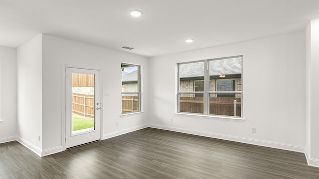 1906 Bobbin Ml, Forney, TX 75126 - spare room with dark wood finished floors, baseboards, and recessed lighting